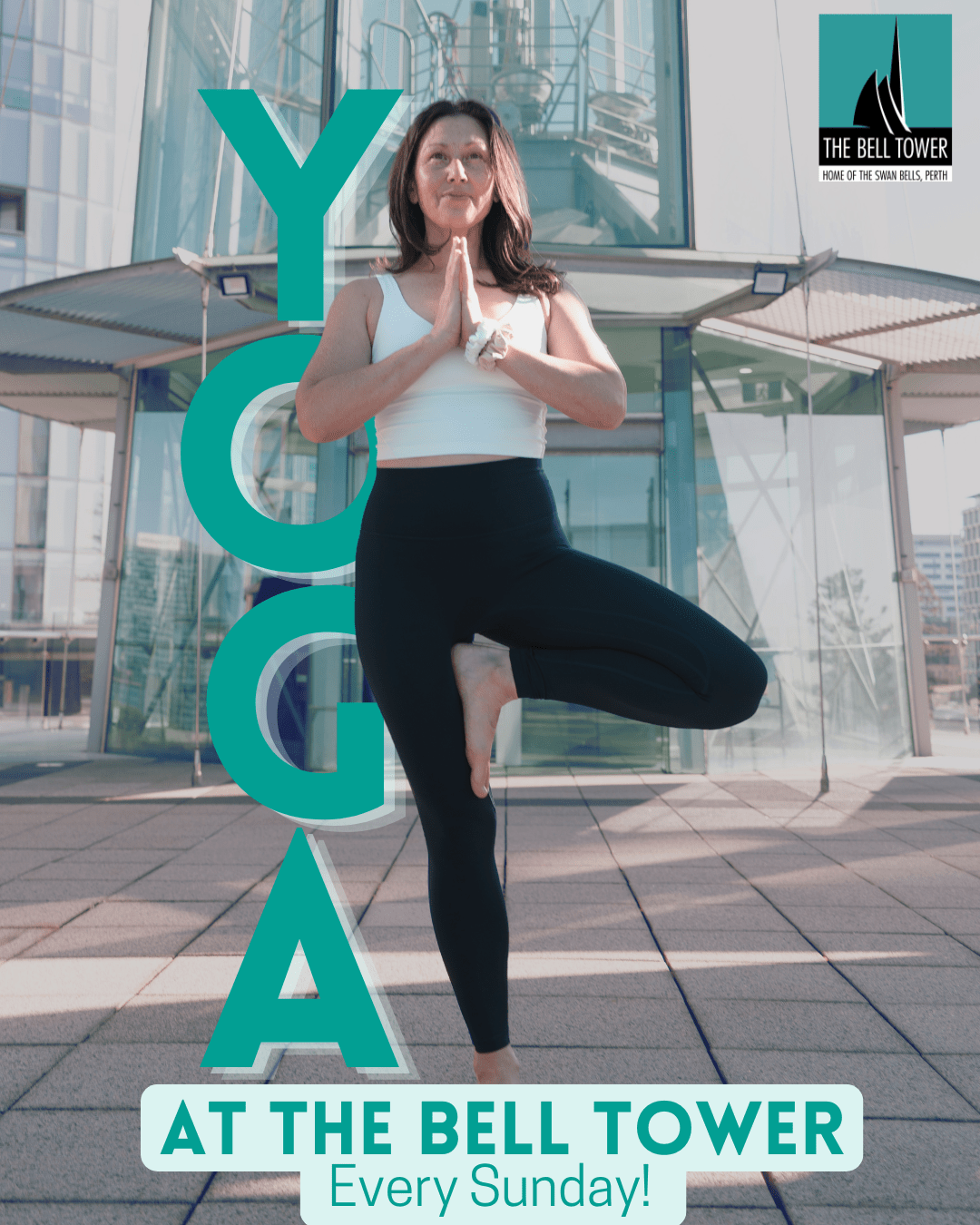 Jane leading a yoga group on The Bell Tower roof top