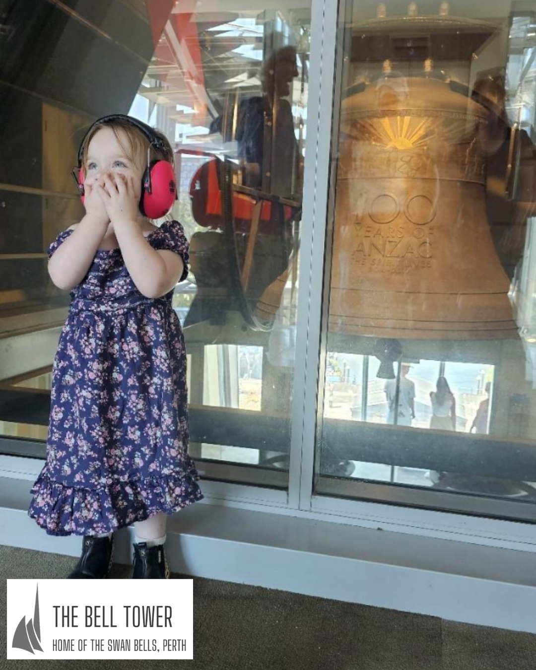 A young girl looks at The ANZAC Bell